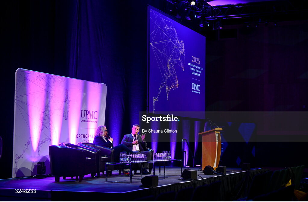 27 September 2025; MC Ger Gilroy of Newstalk Radio, left, and UPMC Sports Medicine and Institute for Health director Ciaran Cosgrave during the UPMC Orthopaedic Care and Sports Medicine Conference at The Convention Centre in Dublin. Photo by Shauna Clinton/Sportsfile