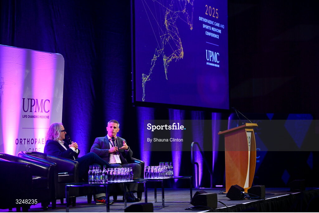 27 September 2025; MC Ger Gilroy of Newstalk Radio, left, and UPMC Sports Medicine and Institute for Health director Ciaran Cosgrave during the UPMC Orthopaedic Care and Sports Medicine Conference at The Convention Centre in Dublin. Photo by Shauna Clinton/Sportsfile