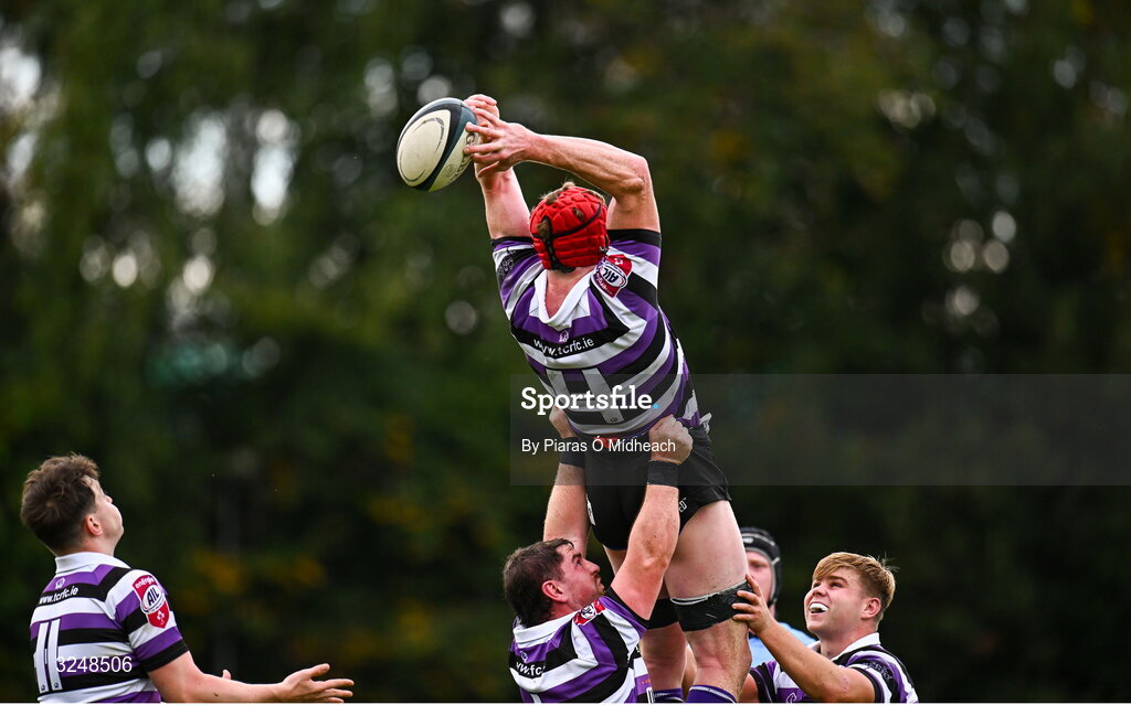 27 September 2025; Sean Rigney of Terenure College RFC holds onto possession with his fingertips during the Energia All-Ireland League Division 1A match between UCD and Terenure College RFC at UCD Bowl in Dublin. Photo by Piaras Ó Mídheach/Sportsfile