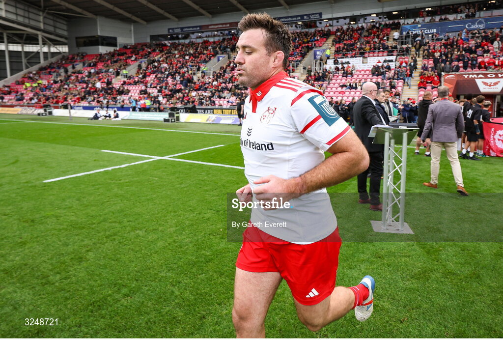 27 September 2025; Niall Scannell of Munster runs out for his 200th appearance in the United Rugby Championship match between Scarlets and Munster at Parc Y Scarlets in Llanelli, Wales. Photo by Gareth Everett/Sportsfile