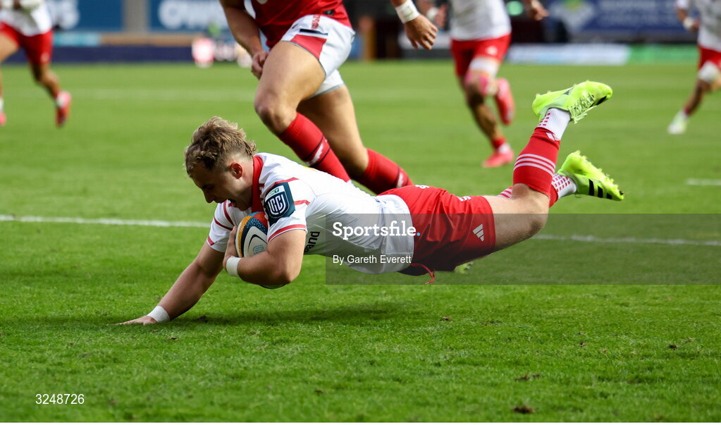27 September 2025; Craig Casey of Munster dives over to score a try during the United Rugby Championship match between Scarlets and Munster at Parc Y Scarlets in Llanelli, Wales. Photo by Gareth Everett/Sportsfile
