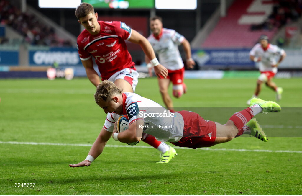 27 September 2025; Craig Casey of Munster dives over to score a try during the United Rugby Championship match between Scarlets and Munster at Parc Y Scarlets in Llanelli, Wales. Photo by Gareth Everett/Sportsfile
