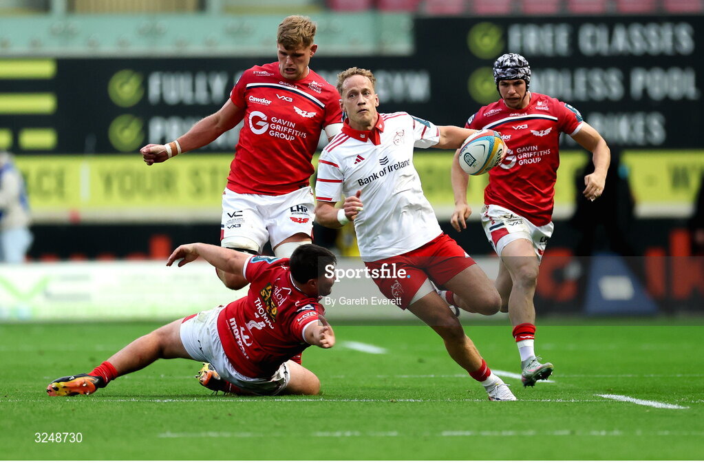 27 September 2025; Mike Haley of Munster makes a break during the United Rugby Championship match between Scarlets and Munster at Parc Y Scarlets in Llanelli, Wales. Photo by Gareth Everett/Sportsfile