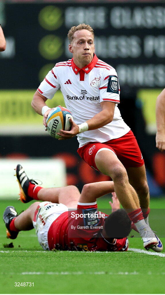 27 September 2025; Mike Haley of Munster makes a break during the United Rugby Championship match between Scarlets and Munster at Parc Y Scarlets in Llanelli, Wales. Photo by Gareth Everett/Sportsfile