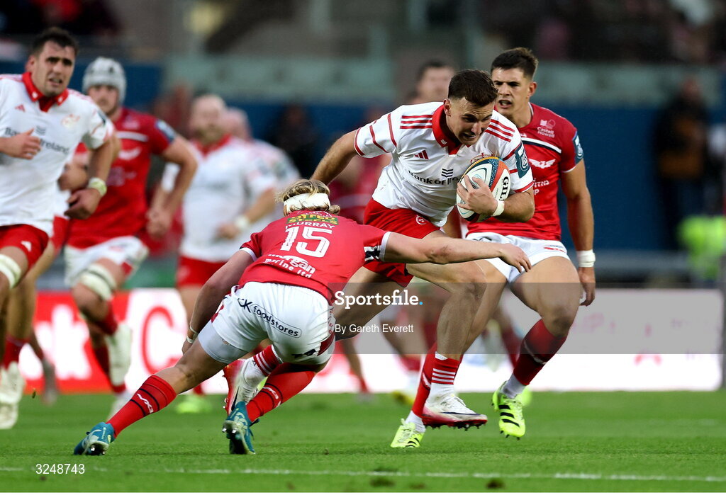 27 September 2025; Shane Daly of Munster is tackled by Blair Murray of Scarlets during the United Rugby Championship match between Scarlets and Munster at Parc Y Scarlets in Llanelli, Wales. Photo by Gareth Everett/Sportsfile