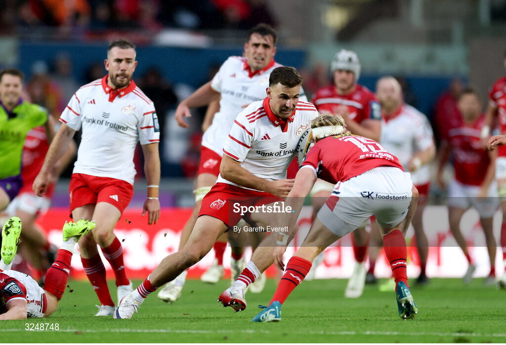 27 September 2025; Shane Daly of Munster is tackled by Blair Murray of Scarlets during the United Rugby Championship match between Scarlets and Munster at Parc Y Scarlets in Llanelli, Wales. Photo by Gareth Everett/Sportsfile