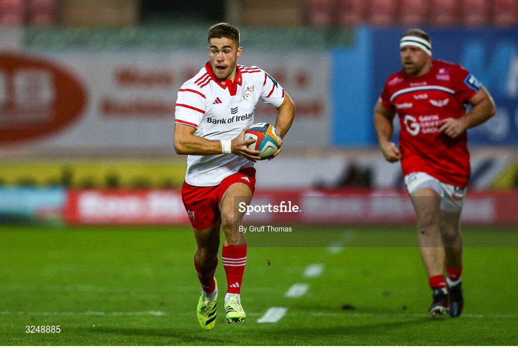 27 September 2025; Jack Crowley of Munster on the attack during the United Rugby Championship match between Scarlets and Munster at Parc Y Scarlets in Llanelli, Wales. Photo by Gruff Thomas/Sportsfile