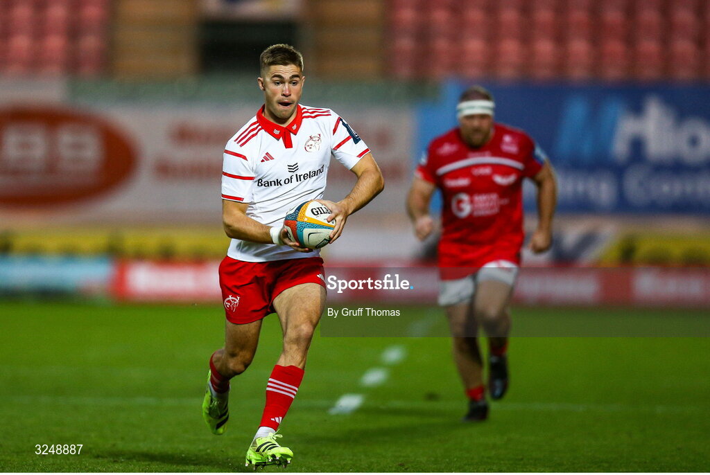 27 September 2025; Jack Crowley of Munster on the attack during the United Rugby Championship match between Scarlets and Munster at Parc Y Scarlets in Llanelli, Wales. Photo by Gruff Thomas/Sportsfile