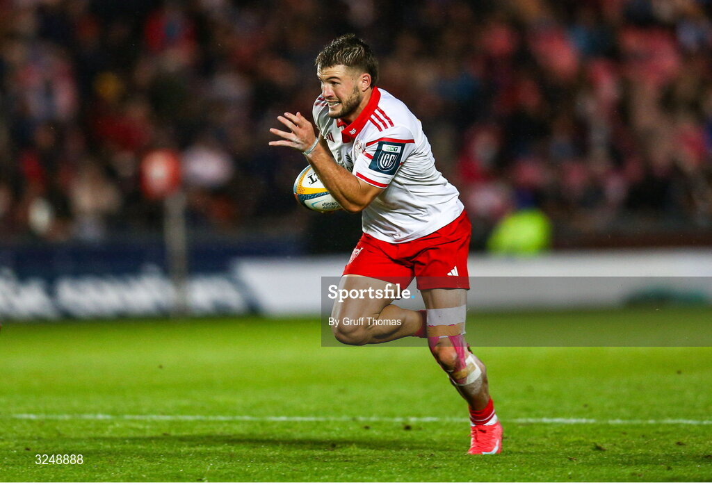 27 September 2025; Alex Nankivell of Munster makes a break during the United Rugby Championship match between Scarlets and Munster at Parc Y Scarlets in Llanelli, Wales. Photo by Gruff Thomas/Sportsfile