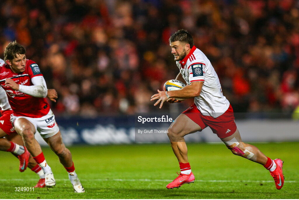 27 September 2025; Alex Nankivell of Munster makes a break during the United Rugby Championship match between Scarlets and Munster at Parc Y Scarlets in Llanelli, Wales. Photo by Gruff Thomas/Sportsfile