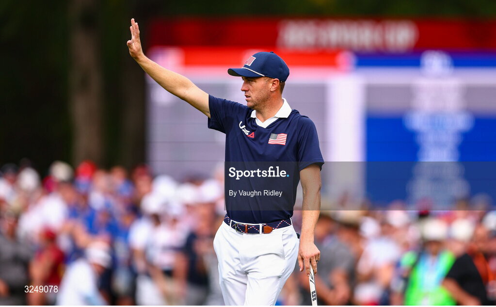 27 September 2025; Justin Thomas of USA appeals for quiet from the fans as Rory McIlroy of Europe putts on the 13th green during the afternoon fourballs on day two of the 2025 Ryder Cup at Black Course at Bethpage State Park Golf Course in Farmingdale, New York, USA. Photo by Vaughn Ridley/Sportsfile