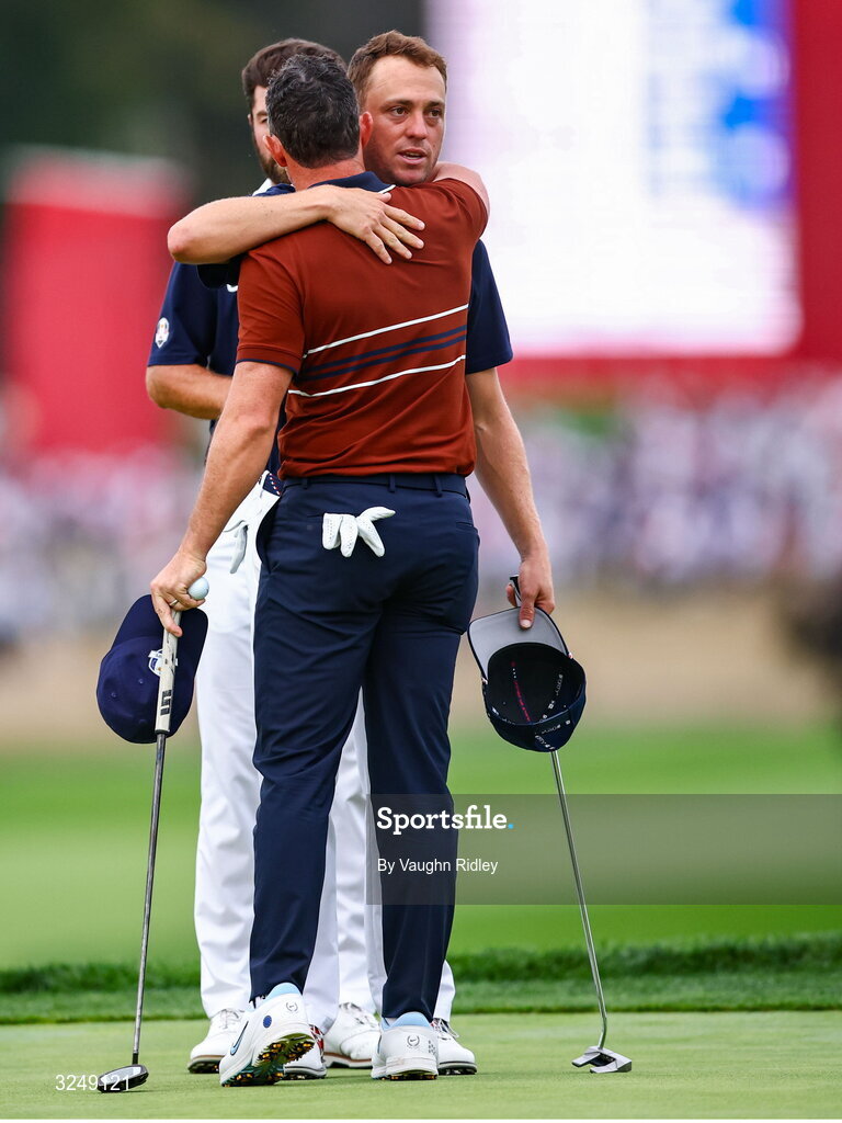 27 September 2025; Rory McIlroy of Europe and Justin Thomas of USA embrace after the afternoon fourballs on day two of the 2025 Ryder Cup at Black Course at Bethpage State Park Golf Course in Farmingdale, New York, USA. Photo by Vaughn Ridley/Sportsfile