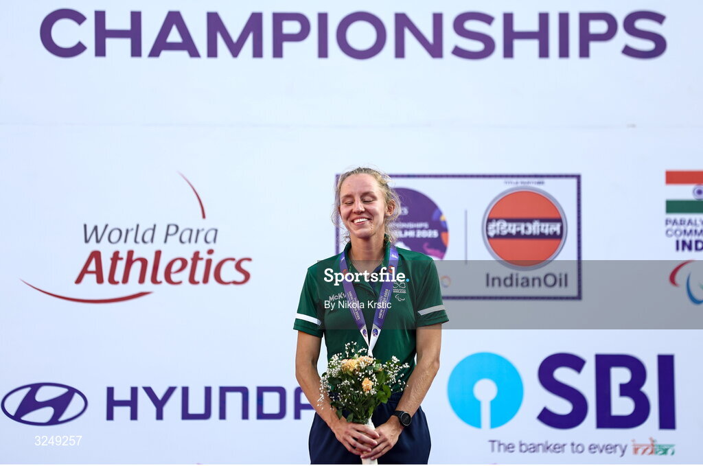 28 September 2025; Greta Streimikyte of team Ireland during the medal ceremony after winning Gold in the Women's 1500m T13 final during day three of the New Delhi 2025 World Para Athletics Championships at JLN Stadium in New Delhi, India. Photo by Nikola Krstic/Sportsfile
