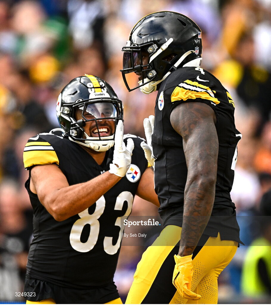 28 September 2025; DK Metcalf, right, celebrates with Pittsburgh Steelers teammate Connor Heyward after scoring a touchdown during the 2025 NFL International Game between the Pittsburgh Steelers and the Minnesota Vikings at Croke Park in Dublin. Photo by Seb Daly/Sportsfile