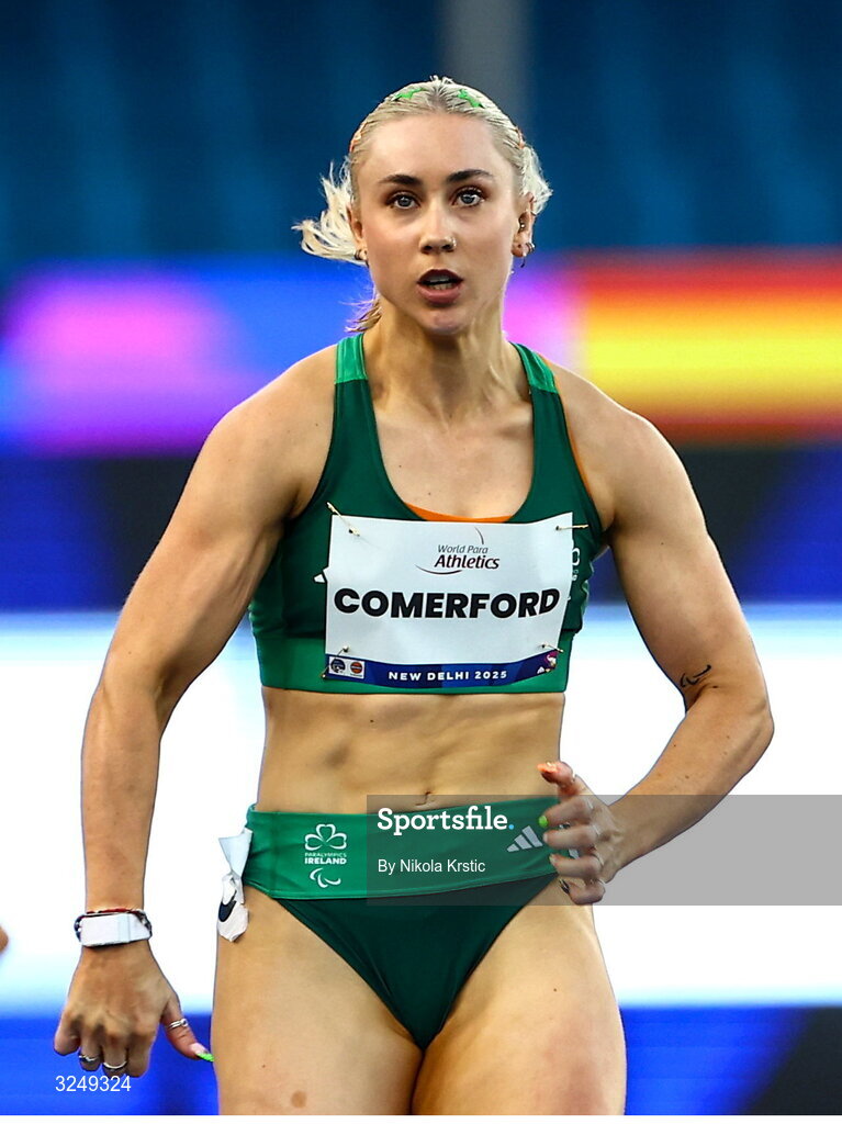 28 September 2025; Orla Comerford of team Ireland on her way to winning Gold in the Women's T13 100m final during day three of the New Delhi 2025 World Para Athletics Championships at JLN Stadium in New Delhi, India. Photo by Nikola Krstic/Sportsfile