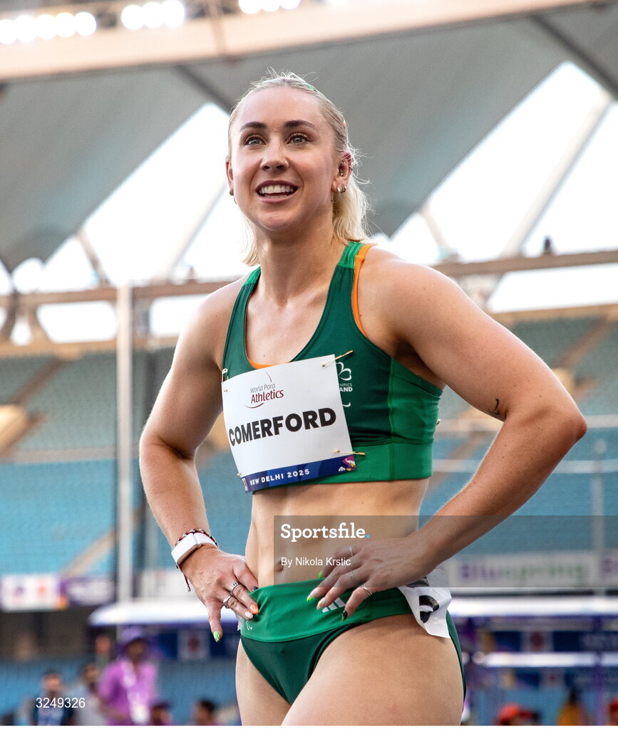 28 September 2025; Orla Comerford of team Ireland celebrates after winning Gold in the Women's T13 100m final during day three of the New Delhi 2025 World Para Athletics Championships at JLN Stadium in New Delhi, India. Photo by Nikola Krstic/Sportsfile