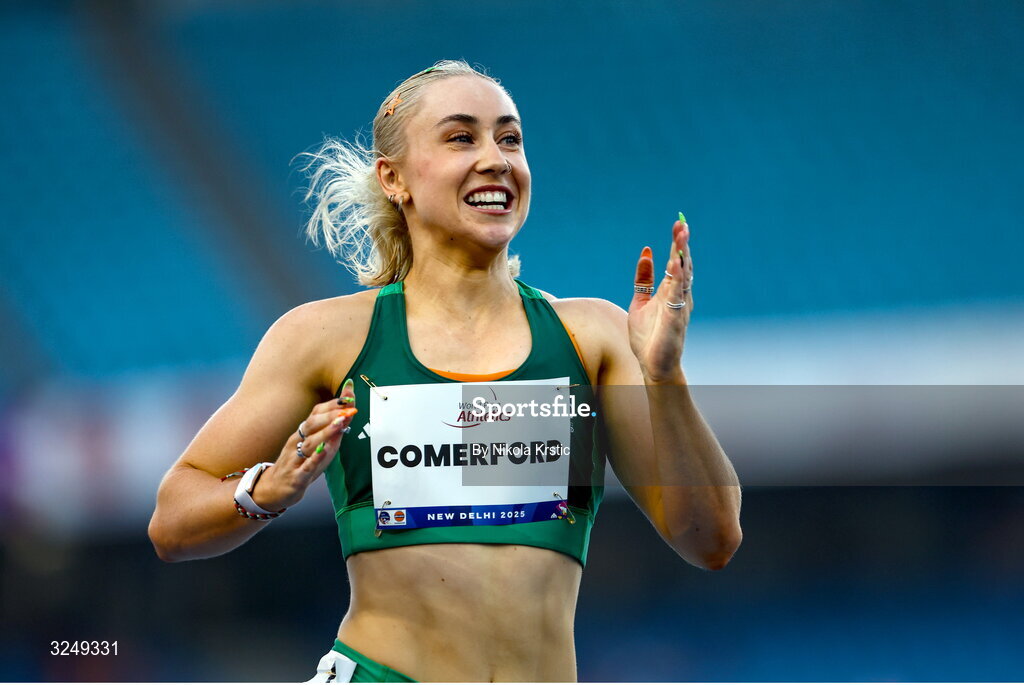 28 September 2025; Orla Comerford of team Ireland celebrates after winning Gold in the Women's T13 100m final during day three of the New Delhi 2025 World Para Athletics Championships at JLN Stadium in New Delhi, India. Photo by Nikola Krstic/Sportsfile