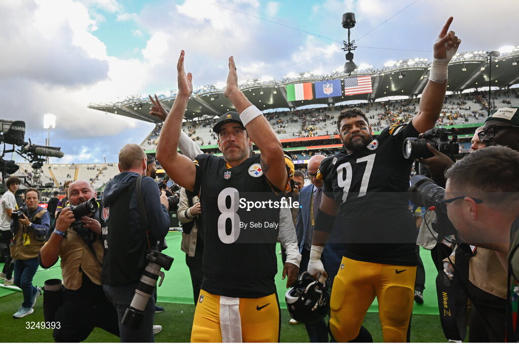 28 September 2025; Aaron Rodgers, centre, and Defensive tackle Cameron Heyward of Pittsburgh Steelers after the 2025 NFL International Game between the Pittsburgh Steelers and the Minnesota Vikings at Croke Park in Dublin. Photo by Seb Daly/Sportsfile