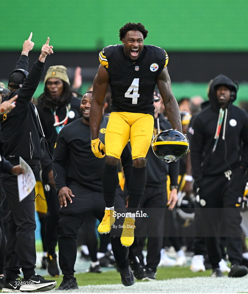 28 September 2025; Wide receiver DK Metcalf #4 of Pittsburgh Steelers celebrates teammate James Pierre making an interception during the 2025 NFL International Game between the Pittsburgh Steelers and the Minnesota Vikings at Croke Park in Dublin. Photo by Seb Daly/Sportsfile