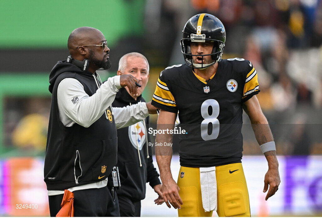 28 September 2025; Pittsburgh Steelers head coach Mike Tomlin and Quarterback Aaron Rodgers #8 of Pittsburgh Steelers during the 2025 NFL International Game between the Pittsburgh Steelers and the Minnesota Vikings at Croke Park in Dublin. Photo by Seb Daly/Sportsfile