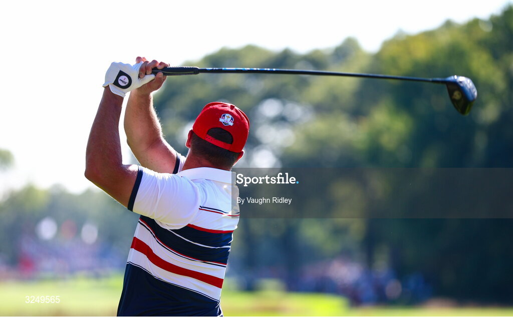 28 September 2025; Bryson DeChambeau of USA watches his tee shot on the 13th hole during the singles matches on day three of the 2025 Ryder Cup at Black Course at Bethpage State Park Golf Course in Farmingdale, New York, USA. Photo by Vaughn Ridley/Sportsfile