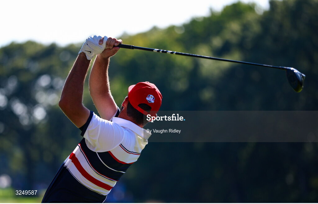 28 September 2025; Scottie Scheffler of USA plays his tee shot on the 13th hole during the singles matches on day three of the 2025 Ryder Cup at Black Course at Bethpage State Park Golf Course in Farmingdale, New York, USA. Photo by Vaughn Ridley/Sportsfile
