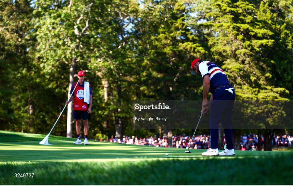 28 September 2025; Scottie Scheffler of USA putts on the 14th green during the singles matches on day three of the 2025 Ryder Cup at Black Course at Bethpage State Park Golf Course in Farmingdale, New York, USA. Photo by Vaughn Ridley/Sportsfile