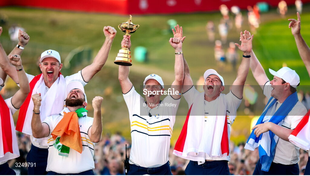 28 September 2025; Europe captain Luke Donald lifts the Ryder Cup, alongside players including Justin Rose, Shane Lowry, Rory McIlroy and Robert MacIntyre on day three of the 2025 Ryder Cup at Black Course at Bethpage State Park Golf Course in Farmingdale, New York, USA. Photo by Vaughn Ridley/Sportsfile