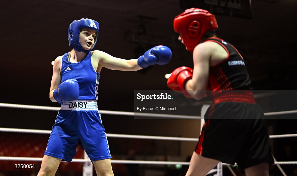 19 September 2025; Daisy Kiernan of Dealgan ABC Louth, left, in action against Paige Nickels of Banbridge ABC Antrim during their 54kg bout at the 2025 IABA National U17 Championship Finals at the National Boxing Stadium in Dublin. Photo by Piaras Ó Mídheach/Sportsfile