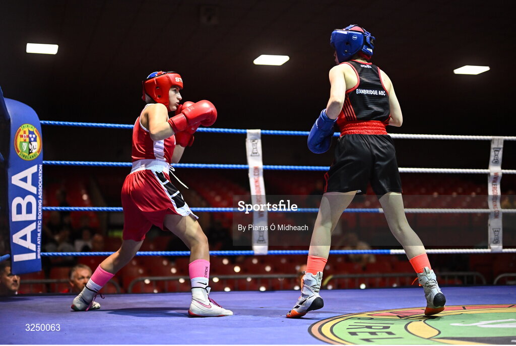 19 September 2025; Tess Ormond of Saviours Crystal BC Waterford in action against Lucie Prentice of Banbridge ABC Antrim during their 50kg bout at the 2025 IABA National U17 Championship Finals at the National Boxing Stadium in Dublin. Photo by Piaras Ó Mídheach/Sportsfile
