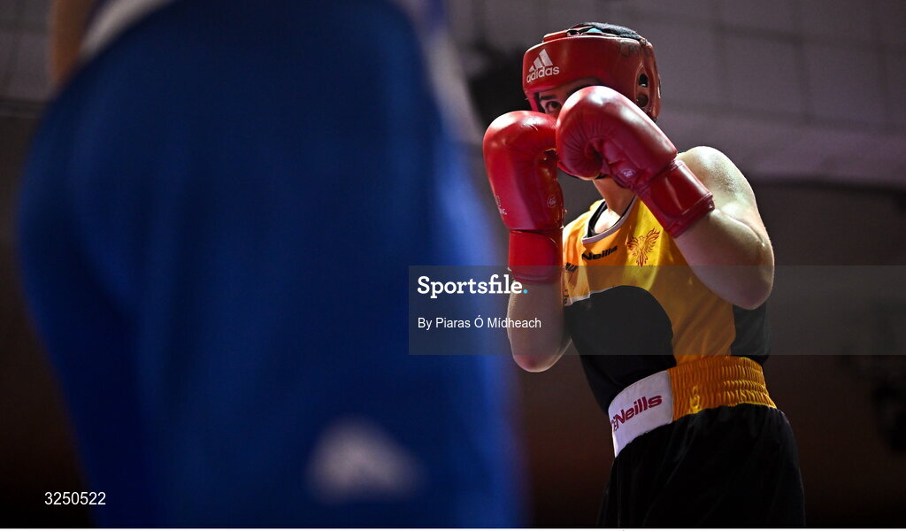 19 September 2025; Cassie Henderson of Phoenix ABC Armagh in action against Gianna Duffy of UNIT 3 BC Naas Kildare during their 70kg bout at the 2025 IABA National U17 Championship Finals at the National Boxing Stadium in Dublin. Photo by Piaras Ó Mídheach/Sportsfile