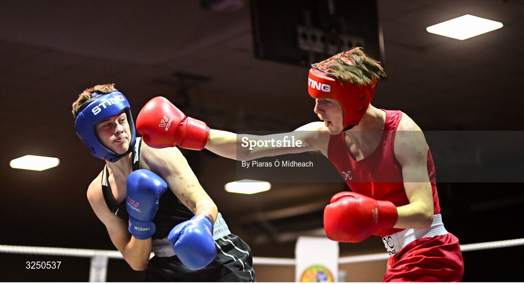 19 September 2025; Hughie Lee Nevin of Sacred Heart BC Dublin, right, in action against Conor Dowds of Immaculata ABC Belfast during their 70kg bout at the 2025 IABA National U17 Championship Finals at the National Boxing Stadium in Dublin. Photo by Piaras Ó Mídheach/Sportsfile