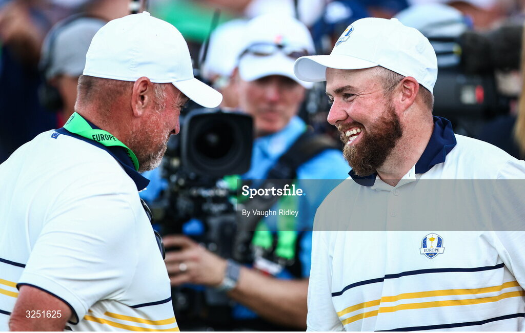 28 September 2025; Shane Lowry of Europe and Europe vice-captain Thomas Bjørn after the singles matches on day three of the 2025 Ryder Cup at Black Course at Bethpage State Park Golf Course in Farmingdale, New York, USA. Photo by Vaughn Ridley/Sportsfile