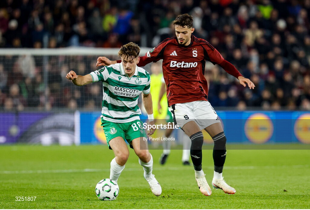 2 October 2025; John McGovern of Shamrock Rovers in action against Albion Rrahmani of Sparta Praha during the UEFA Conference League 2025/26 league phase match between Sparta Praha and Shamrock Rovers at epet ARENA in Prague, Czechia. Photo by Pavel Lebeda/Sportsfile