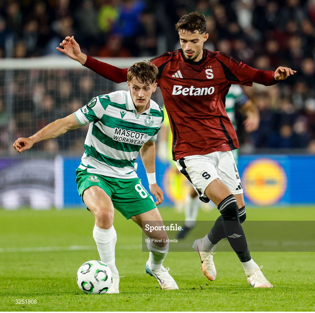 2 October 2025; John McGovern of Shamrock Rovers in action against Albion Rrahmani of Sparta Praha during the UEFA Conference League 2025/26 league phase match between Sparta Praha and Shamrock Rovers at epet ARENA in Prague, Czechia. Photo by Pavel Lebeda/Sportsfile