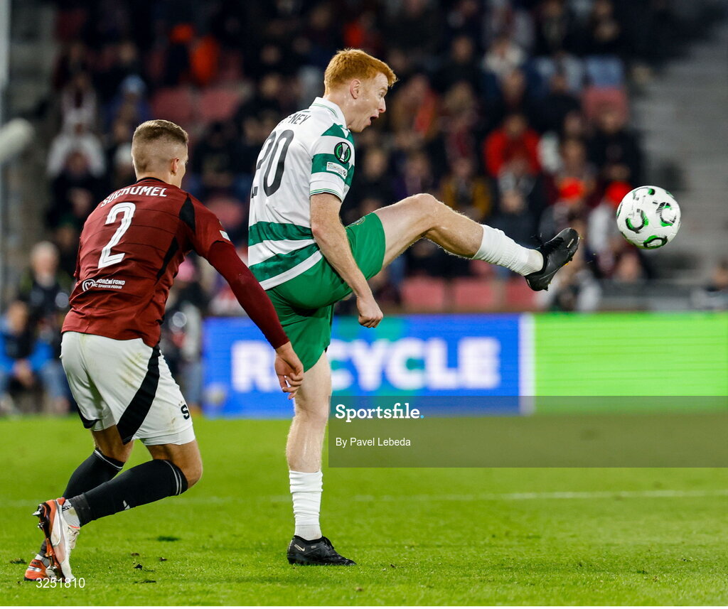 2 October 2025; Rory Gaffney of Shamrock Rovers in action against Martin Suchomel of Sparta Praha during the UEFA Conference League 2025/26 league phase match between Sparta Praha and Shamrock Rovers at epet ARENA in Prague, Czechia. Photo by Pavel Lebeda/Sportsfile