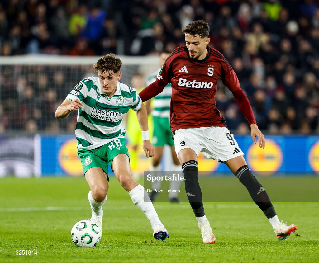 2 October 2025; John McGovern of Shamrock Rovers in action against Albion Rrahmani of Sparta Praha during the UEFA Conference League 2025/26 league phase match between Sparta Praha and Shamrock Rovers at epet ARENA in Prague, Czechia. Photo by Pavel Lebeda/Sportsfile