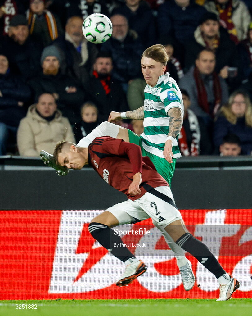 2 October 2025; Danny Grant of Shamrock Rovers in action against Martin Suchomel of Sparta Praha during the UEFA Conference League 2025/26 league phase match between Sparta Praha and Shamrock Rovers at epet ARENA in Prague, Czechia. Photo by Pavel Lebeda/Sportsfile