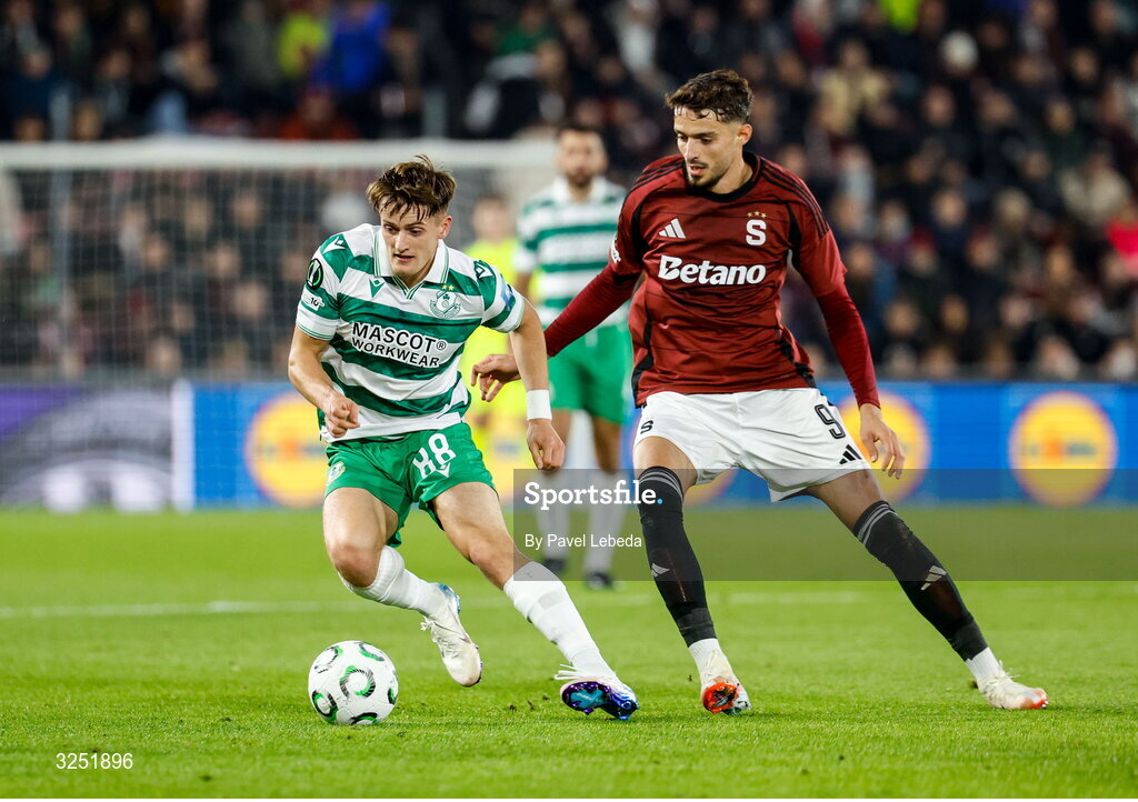 2 October 2025; John McGovern of Shamrock Rovers in action against Albion Rrahmani of Sparta Praha during the UEFA Conference League 2025/26 league phase match between Sparta Praha and Shamrock Rovers at epet ARENA in Prague, Czechia. Photo by Pavel Lebeda/Sportsfile