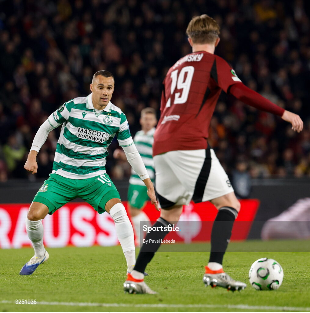 2 October 2025; Graham Burke of Shamrock Rovers in action against Adam Ševínský of Sparta Praha during the UEFA Conference League 2025/26 league phase match between Sparta Praha and Shamrock Rovers at epet ARENA in Prague, Czechia. Photo by Pavel Lebeda/Sportsfile