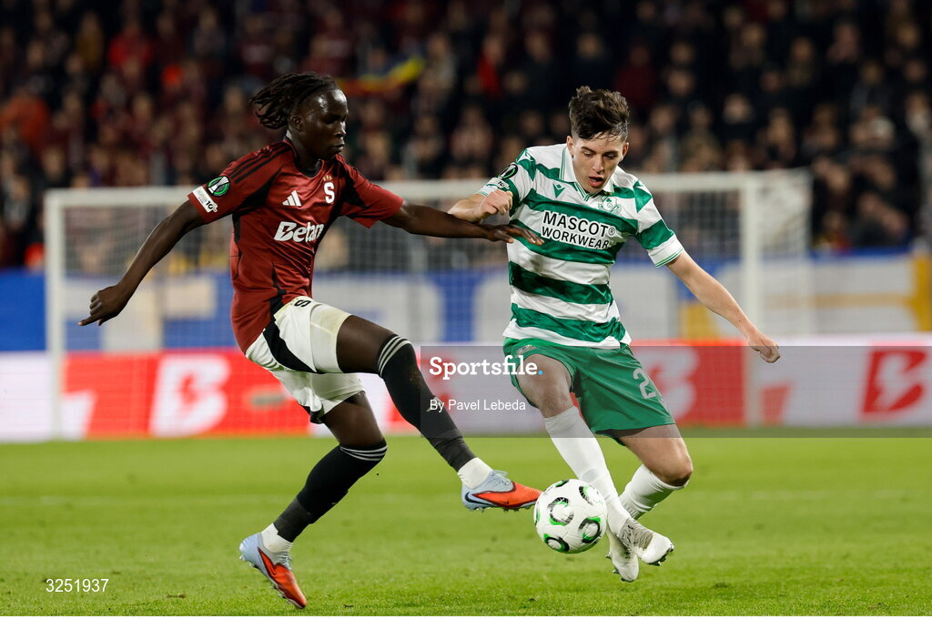 2 October 2025; Cory O'Sullivan of Shamrock Rovers in action against Garang Kuol of Sparta Praha during the UEFA Conference League 2025/26 league phase match between Sparta Praha and Shamrock Rovers at epet ARENA in Prague, Czechia. Photo by Pavel Lebeda/Sportsfile