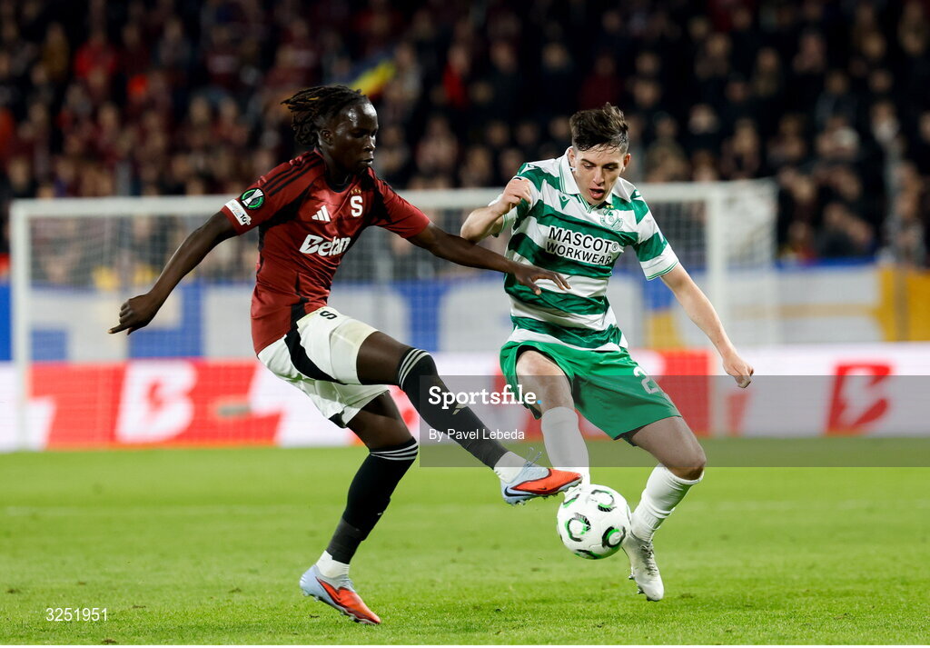 2 October 2025; Cory O'Sullivan of Shamrock Rovers in action against Garang Kuol of Sparta Praha during the UEFA Conference League 2025/26 league phase match between Sparta Praha and Shamrock Rovers at epet ARENA in Prague, Czechia. Photo by Pavel Lebeda/Sportsfile