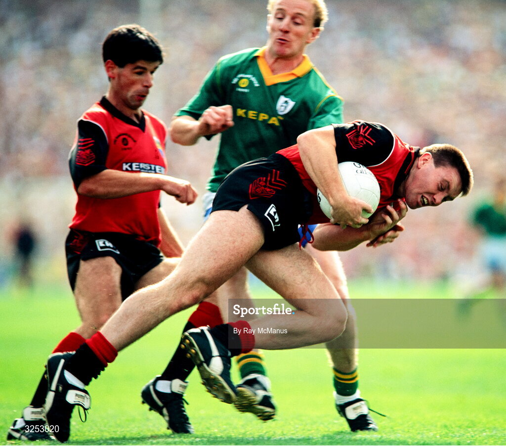 15 September 1991; Peter Withnell of Down is tackled by Martin O'Connell of Meath during the All-Ireland Senior Football Championship Final between Down and Meath at Croke Park in Dublin. Photo by Ray McManus/Sportsfile