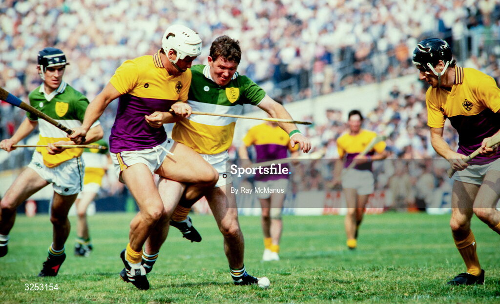 8 July 1984; Pat Kenny of Wexford in action against Padraig Horan of Offaly during the Leinster Senior Hurling Championship Final between Offaly and Wexford at Croke Park in Dublin. Photo by Ray McManus/Sportsfile