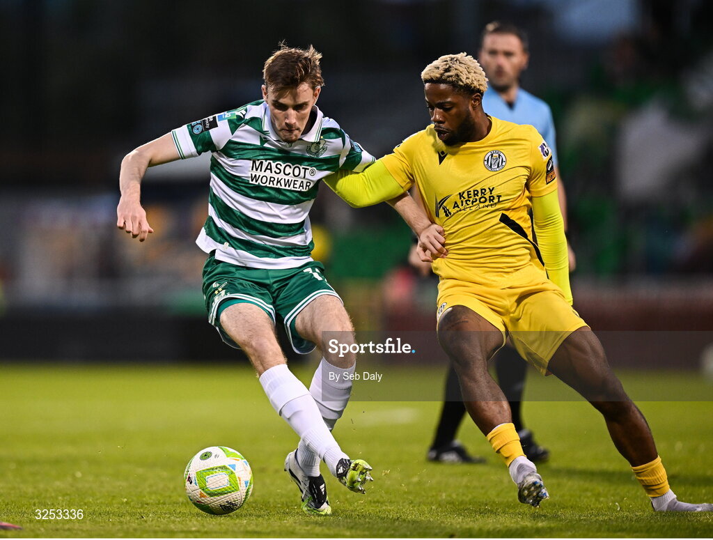 5 October 2025; Matt Healy of Shamrock Rovers in action against Daniel Okwute of Kerry FC during the Sports Direct Men’s FAI Cup semi-final match between Shamrock Rovers and Kerry FC at Tallaght Stadium in Dublin. Photo by Seb Daly/Sportsfile
