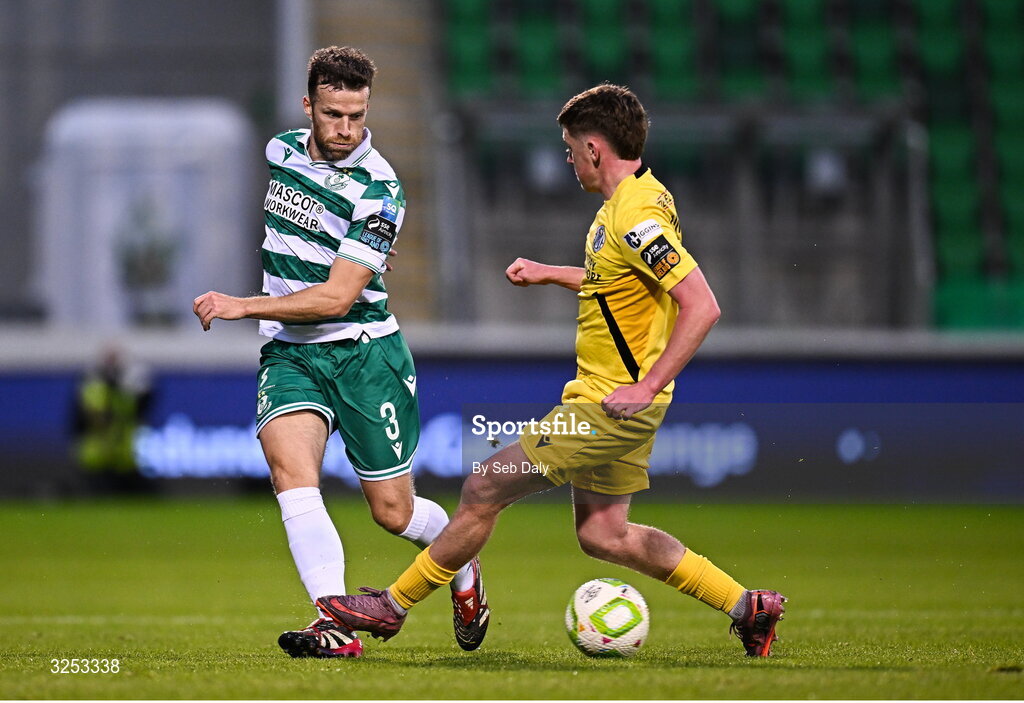 5 October 2025; Adam Matthews of Shamrock Rovers in action against Sean O'Connell of Kerry FC during the Sports Direct Men’s FAI Cup semi-final match between Shamrock Rovers and Kerry FC at Tallaght Stadium in Dublin. Photo by Seb Daly/Sportsfile