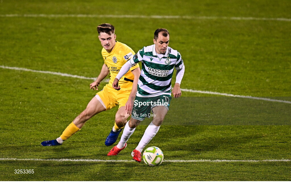 5 October 2025; Sean Kavanagh of Shamrock Rovers in action against Oran Crowe of Kerry FC during the Sports Direct Men’s FAI Cup semi-final match between Shamrock Rovers and Kerry FC at Tallaght Stadium in Dublin. Photo by Seb Daly/Sportsfile