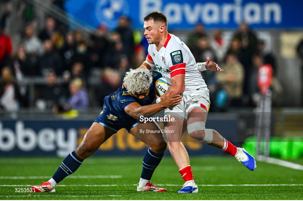26 September 2025; Zac Ward of Ulster is tackled by Fine Inisi of Dragons during the United Rugby Championship match between Ulster and Dragons at Affidea Stadium in Belfast. Photo by Shauna Clinton/Sportsfile