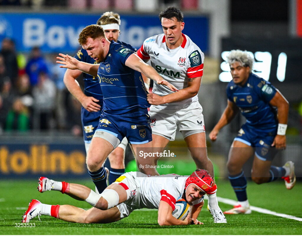 26 September 2025; Michael Lowry of Ulster is tackled by Aneurin Owen of Dragons during the United Rugby Championship match between Ulster and Dragons at Affidea Stadium in Belfast. Photo by Shauna Clinton/Sportsfile