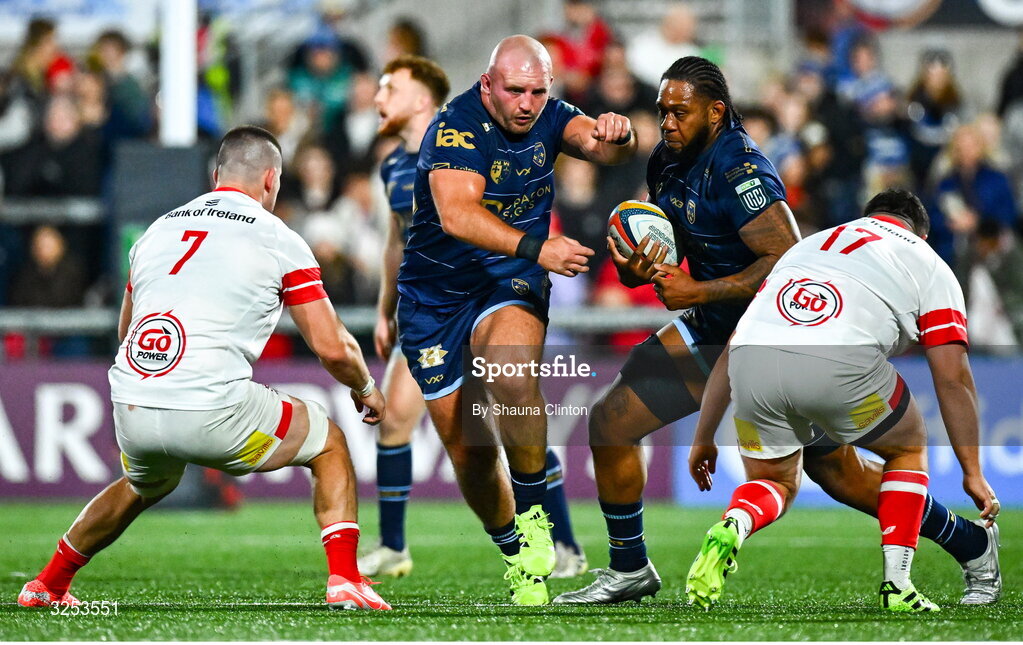 26 September 2025; Levi Douglas of Dragons in action against Ulster players Nick Timoney, left, and Sam Crean during the United Rugby Championship match between Ulster and Dragons at Affidea Stadium in Belfast. Photo by Shauna Clinton/Sportsfile